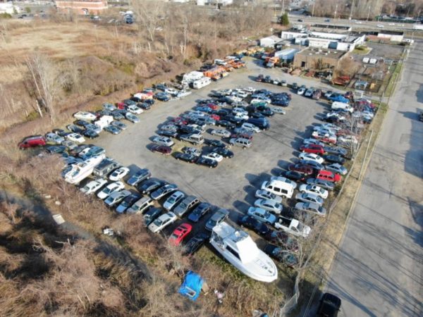 birds eye view of vehicles for sale at maltz auctions in new york