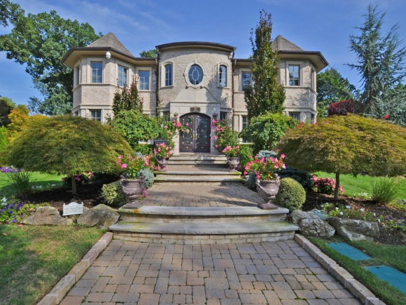outside of spectacular custom home for sale at maltz private auctions