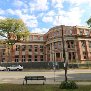 outside of 144,000 square foot building for sale at maltz auctions in new york
