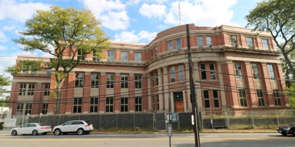 outside of 144,000 square foot building for sale at maltz auctions in new york