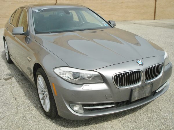 front of gray bmw vehicle up for sale at maltz auctions in new york city