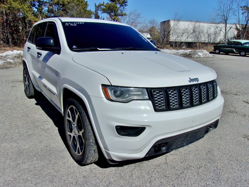 white jeep vehicle for sale at maltz auto auctions in new york