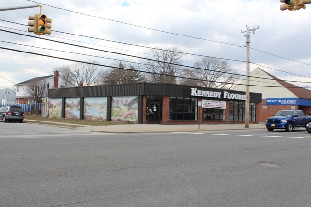 exterior of retail building for sale at maltz auctions in new york city