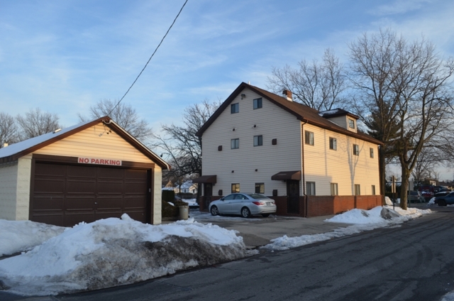exterior of family building for sale at maltz auctions