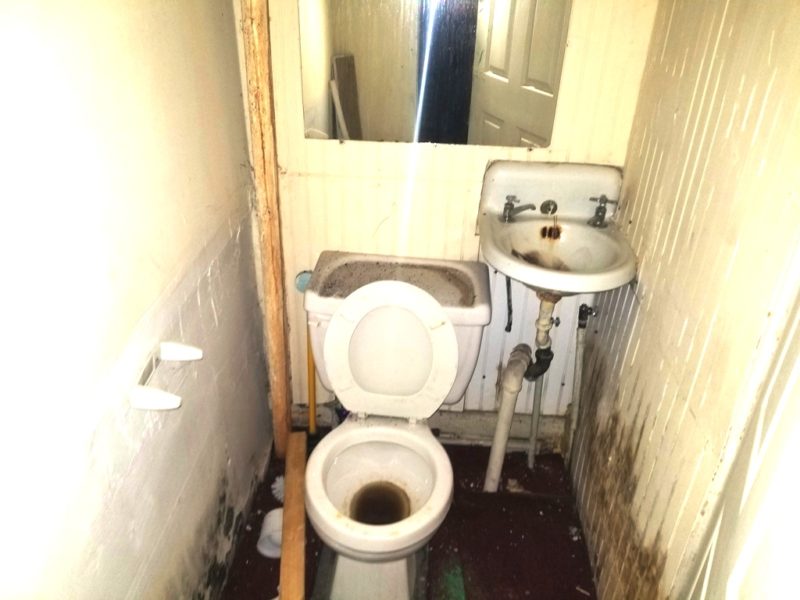 bathroom in mixed use building for sale at maltz auctions