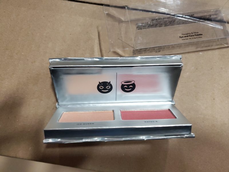 open makeup on top of box for sale at maltz auctions