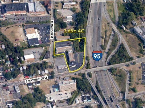 aerial view of 137 room hotel building for sale at maltz auctions