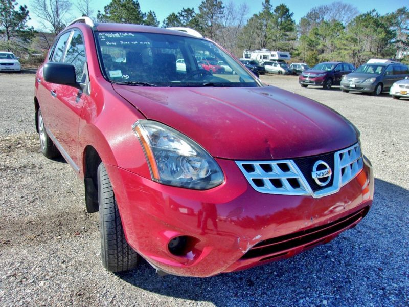 red nissan vehicle for sale at maltz auto auctions