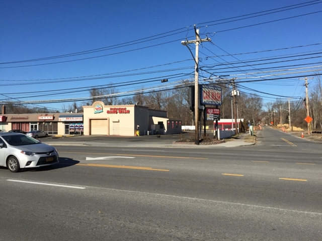 exterior of car wash building up for sale at maltz auctions