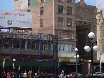 exterior of 8-story building for sale at maltz auctions in new york city