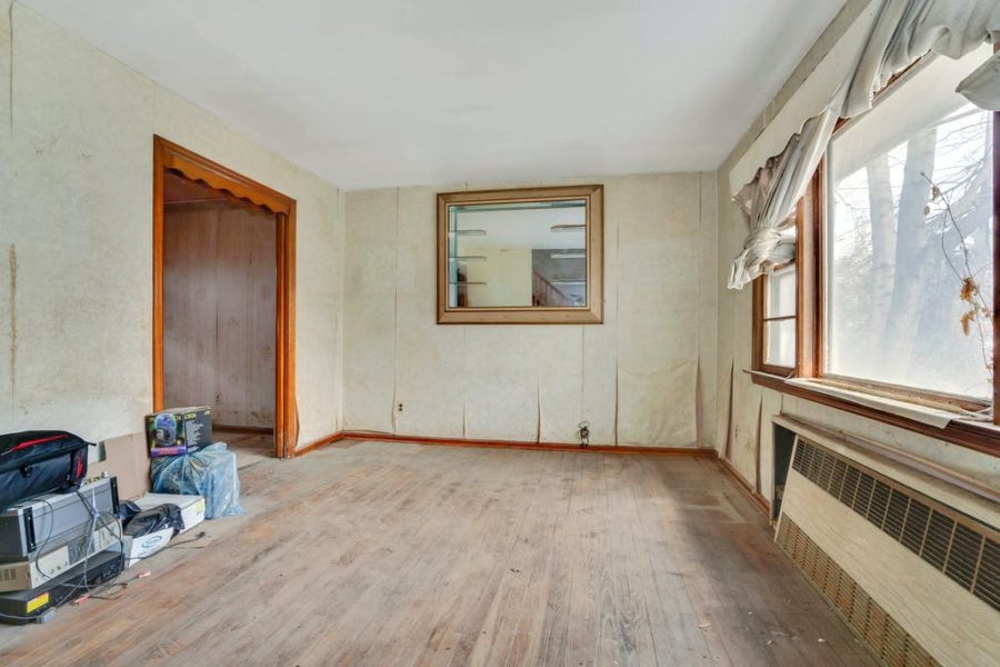 living room area of home for sale at maltz auctions in new york