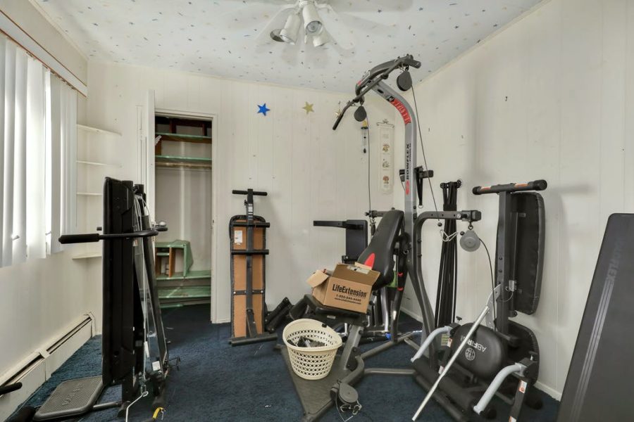 exercise room of home for sale at maltz auctions in new york