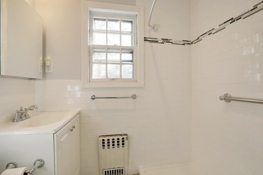 bathroom interior of home for sale at maltz auctions in new york