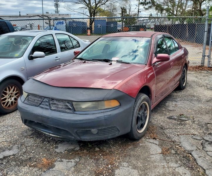 red car for sale at maltz auto auctions