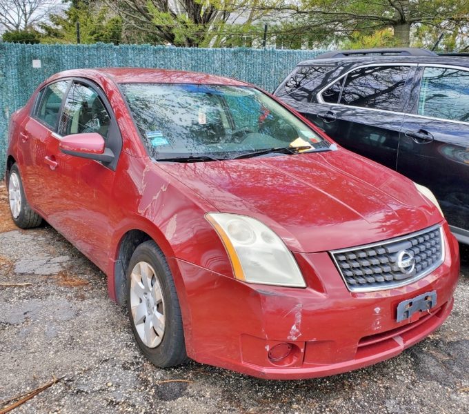 red nissan car for sale at maltz auto auctions in new york