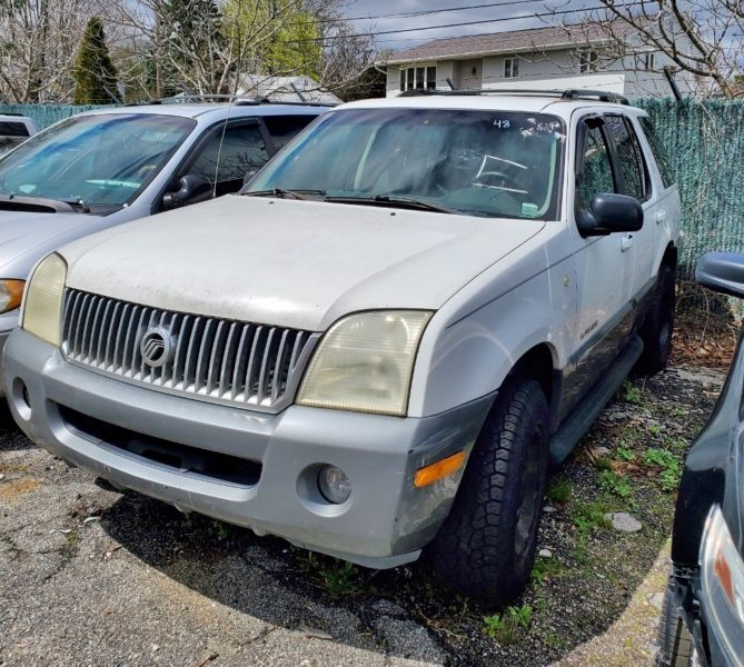 white car for sale at maltz auto auctions