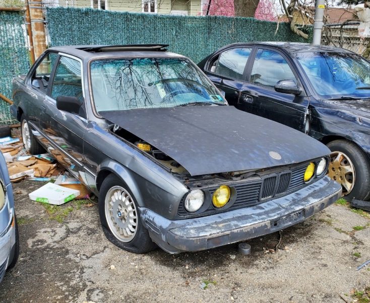 damaged black car for sale at maltz auto auctions