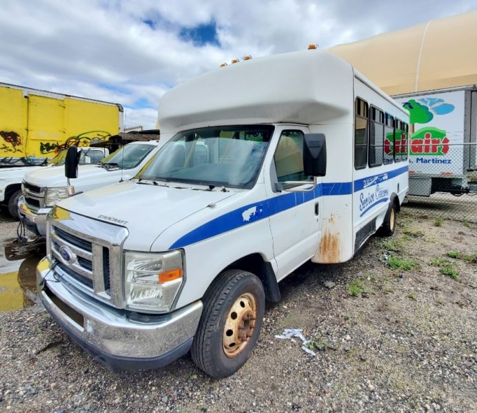 white vehicle for sale at maltz auctions in new york