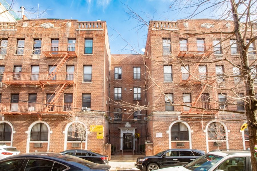 exterior of duplex condo for sale at maltz auctions in new york