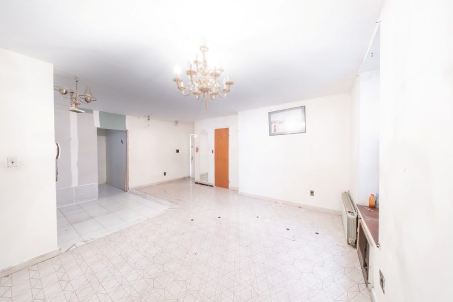 living area of duplex condo for sale at maltz auctions in new york