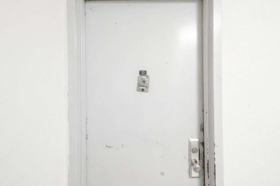 door of duplex condo for sale at maltz auctions in new york