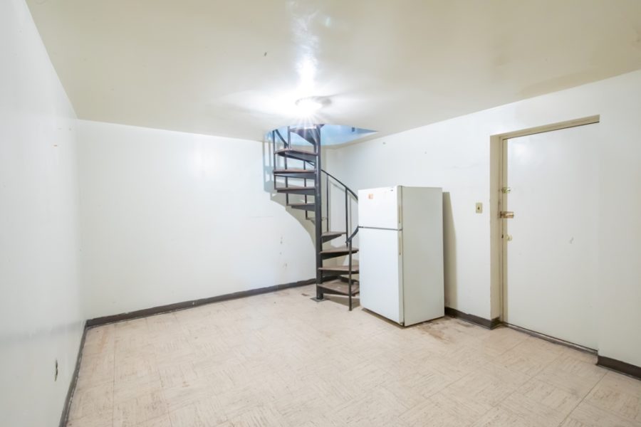 basement of duplex condo for sale at maltz auctions in new york