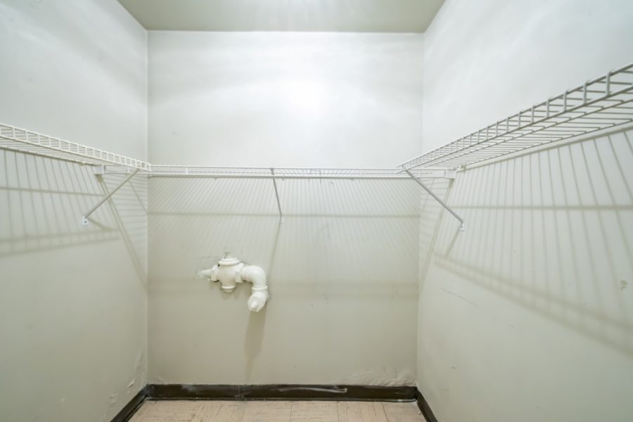 closet of duplex condo for sale at maltz auctions in new york