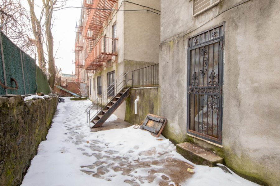 backside of duplex condo for sale at maltz auctions in new york