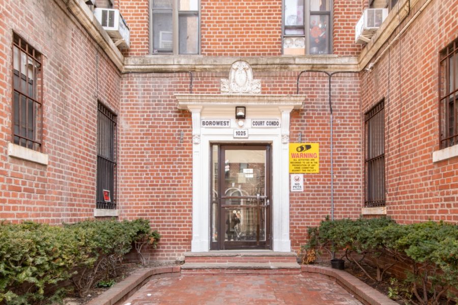 exterior entryway of duplex condo for sale at maltz auctions in new york