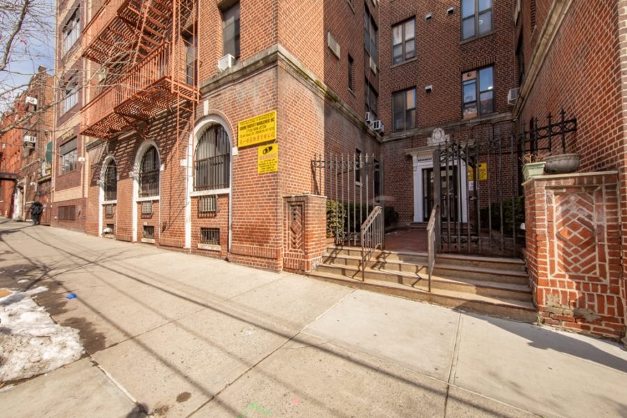 exterior of duplex condo for sale at maltz auctions in new york