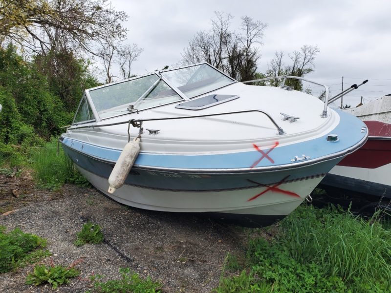 blue and white boat for sale by maltz auctions in new york