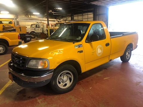 yellow truck for sale at maltz auto auctions