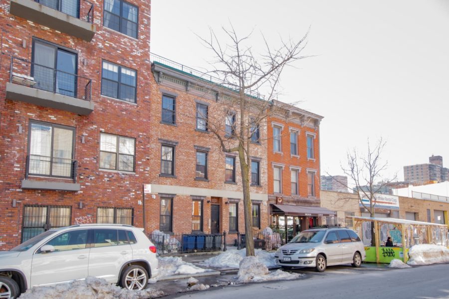 front of multi-family building for sale at maltz auctions in new york