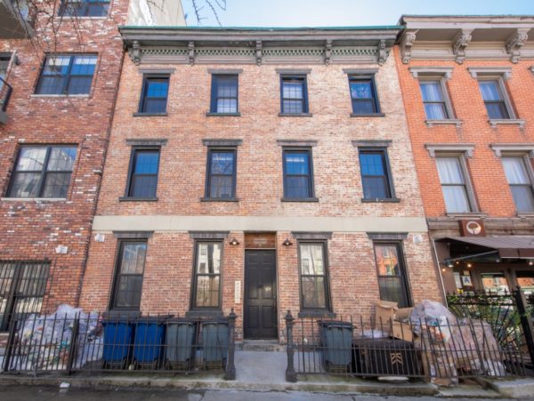 front of multi-family building for sale at maltz auctions in new york