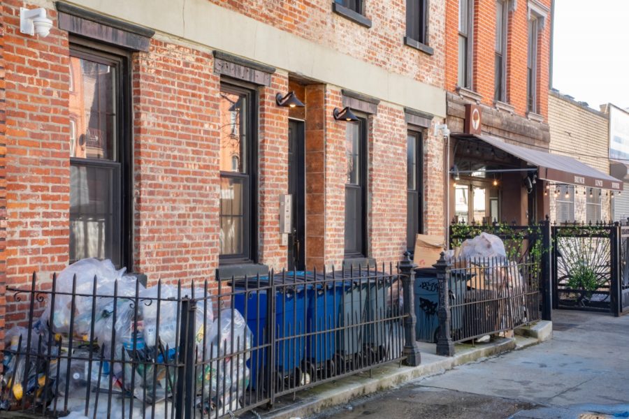outside of multi-family building up for auction at maltz auctions in new york