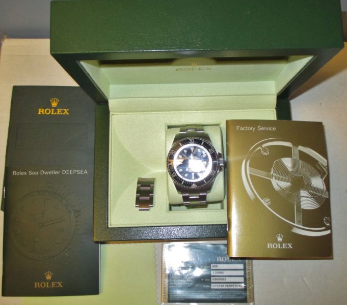 rolex watch and pamphlets for sale by maltz auctions