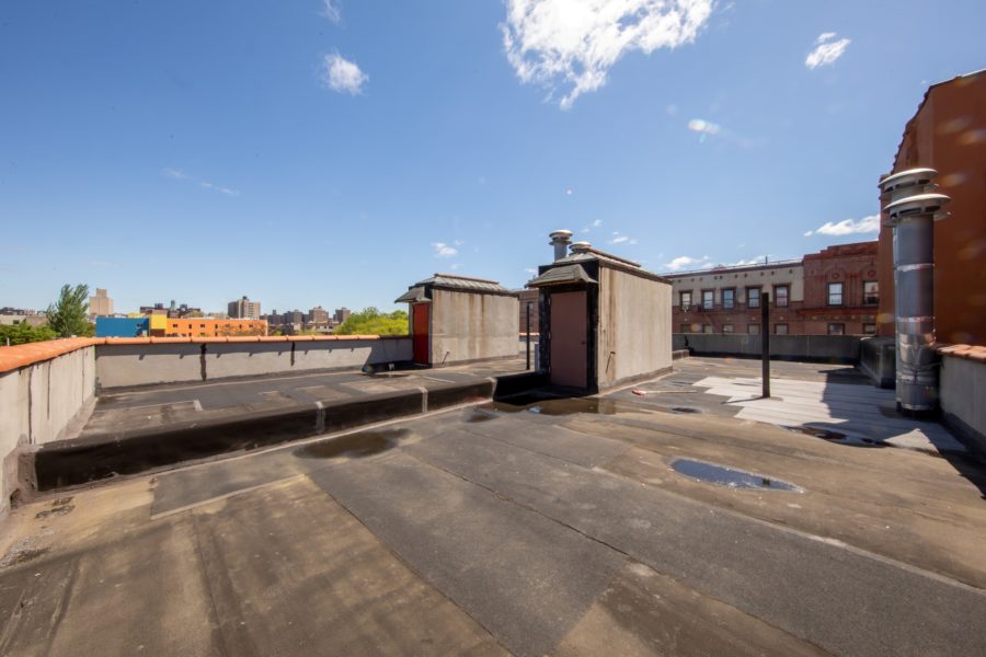 rooftop of 16 unit multifamily building for sale at maltz auctions