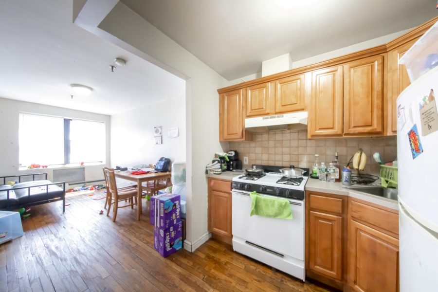 kitchen inside 16 unit multifamily building for sale at maltz auctions