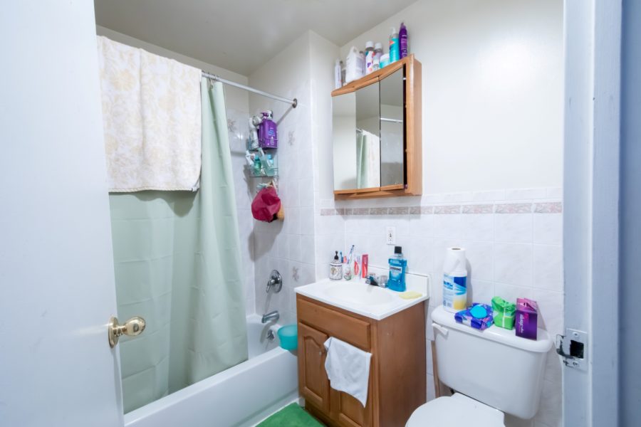 bathroom inside 16 unit multifamily building for sale at maltz auctions