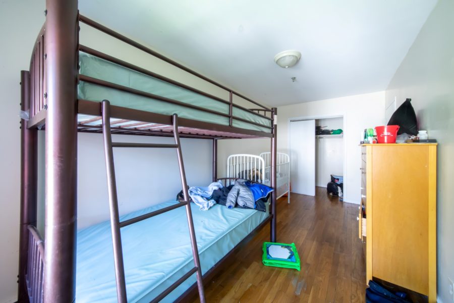 bedroom of 16-unit multifamily building for sale at maltz auctions in new york