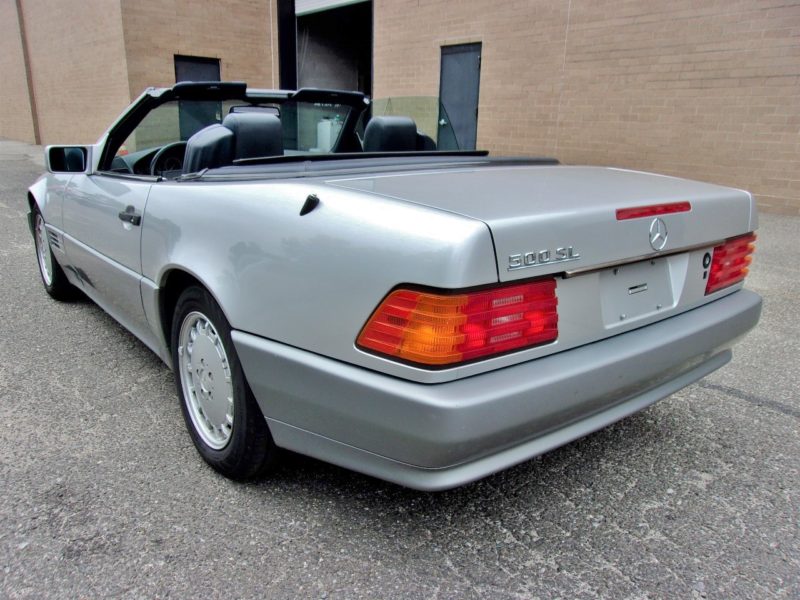 angled back of old silver mercedes convertible for sale at maltz automobile auctions