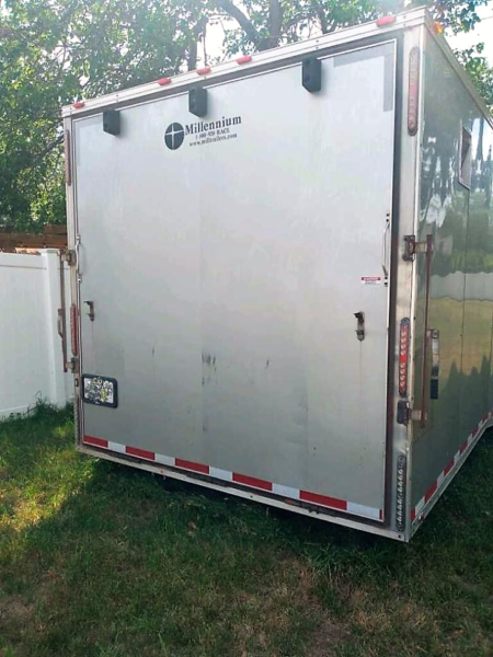 outside of millenium trailer up for sale at maltz auctions in new york city