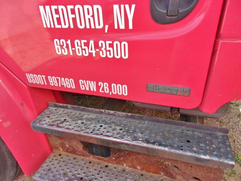 steps and logo of truck for sale at maltz auctions in new york