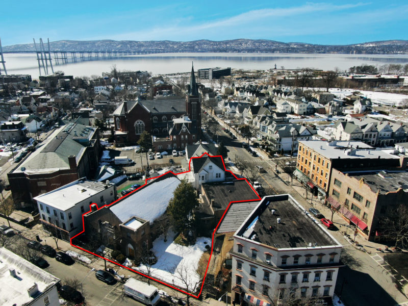 birds eye view of three buildings for sale at maltz auctions