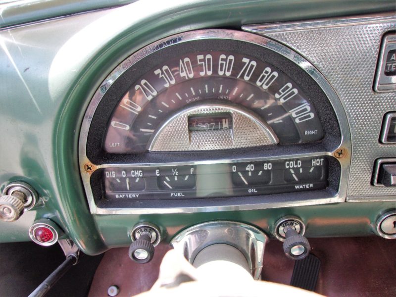 View of speedometer of old Pontiac up for auction