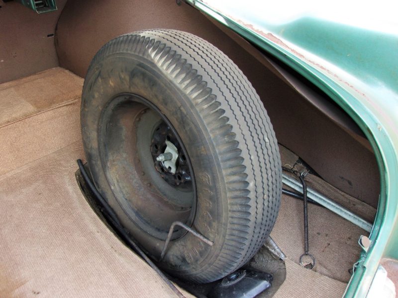Close up of spare tire on old pontiac car up for auction at Maltz Auctions in NYC