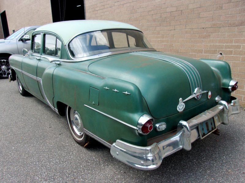 Rearview of old Pontiac car up for auction at Maltz Auctions