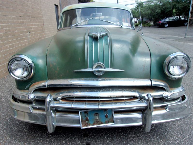 Front view of old Pontiac car up for auction at Maltz Auctions