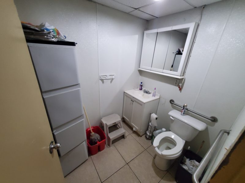 bathroom of 7,600 square foot renovated building up for auction