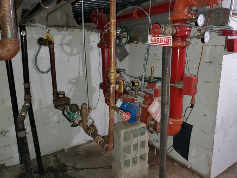 main drain valve inside 7,600 square foot renovated building up for auction